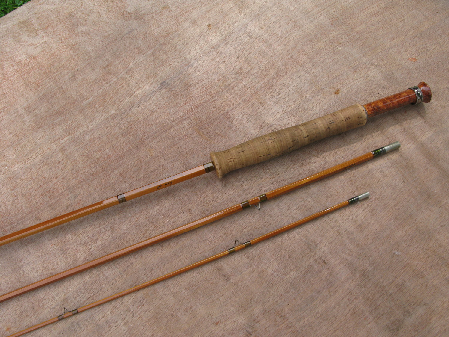 Portions of a beautifully crafted Raine bamboo fly rod.